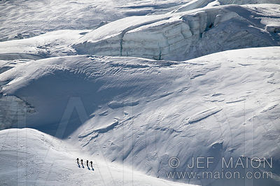 Alpine touring skiers on glacier