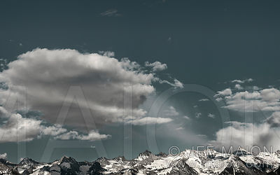 Mountain range below blue sky