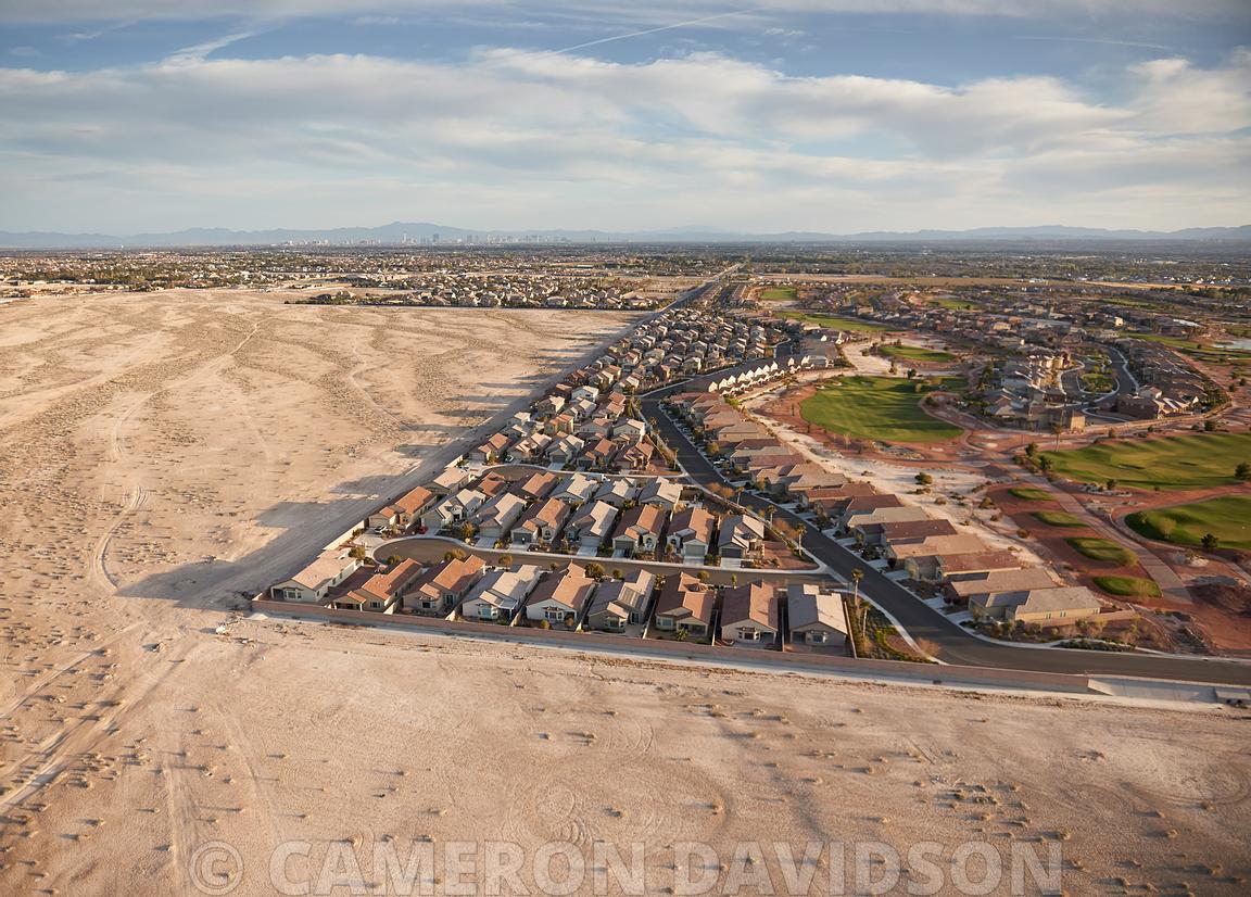 Aerial Stock Aerial photograph of North Las Vegas suburbs abutting