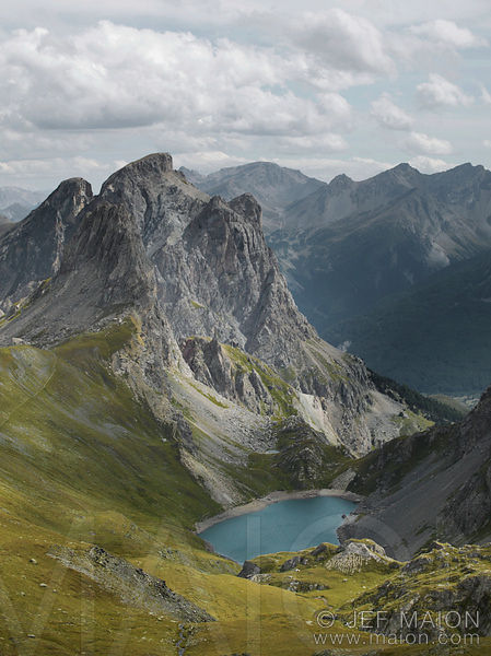 Rock peak and lake seen from above