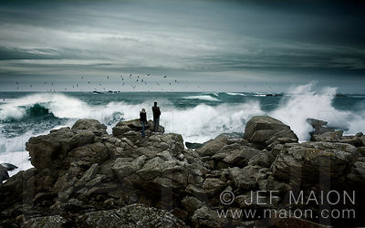 Couple watching sea storm weather