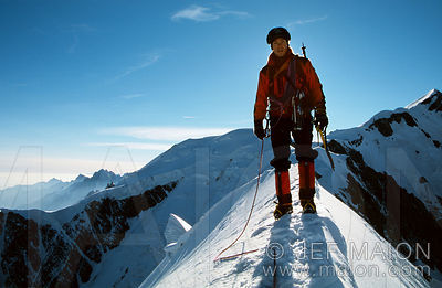 Climber on the summit of the Bionnassay Aiguille