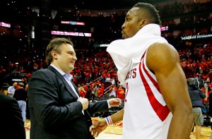 Rockets GM Daryl Morey talks to star center Dwight Howard