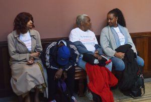 Photo at top: Chicagoans, including Aiyanna Allen (far right), wait outside a packed committee room to decide the fate of the elected school board bill. (Emily Olsen / MEDILL)