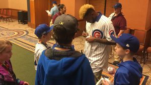Pitcher Jose Rosario signs autographs
