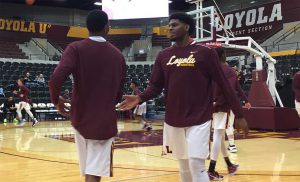 Aundre Jackson warms up before a game against Bradley