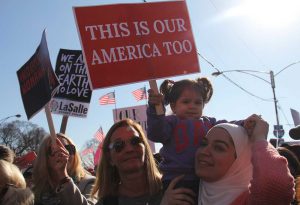 Mother and daughter attend the Women's March in Chicago to take a stance against anti-immigrant talk
