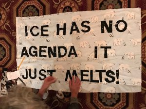 SAIC students and faculty create handmade protest banners.