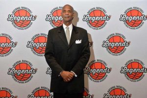 La Rue Martin poses for a photo at a National Basketball Retired Players Association event.