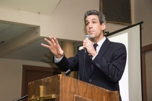 State Senator Daniel Biss, D-9, speaks at the podium