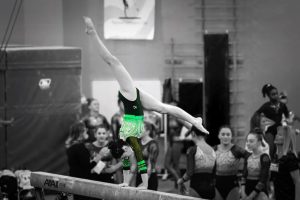 Elli Brownfield performs on the balance beam.