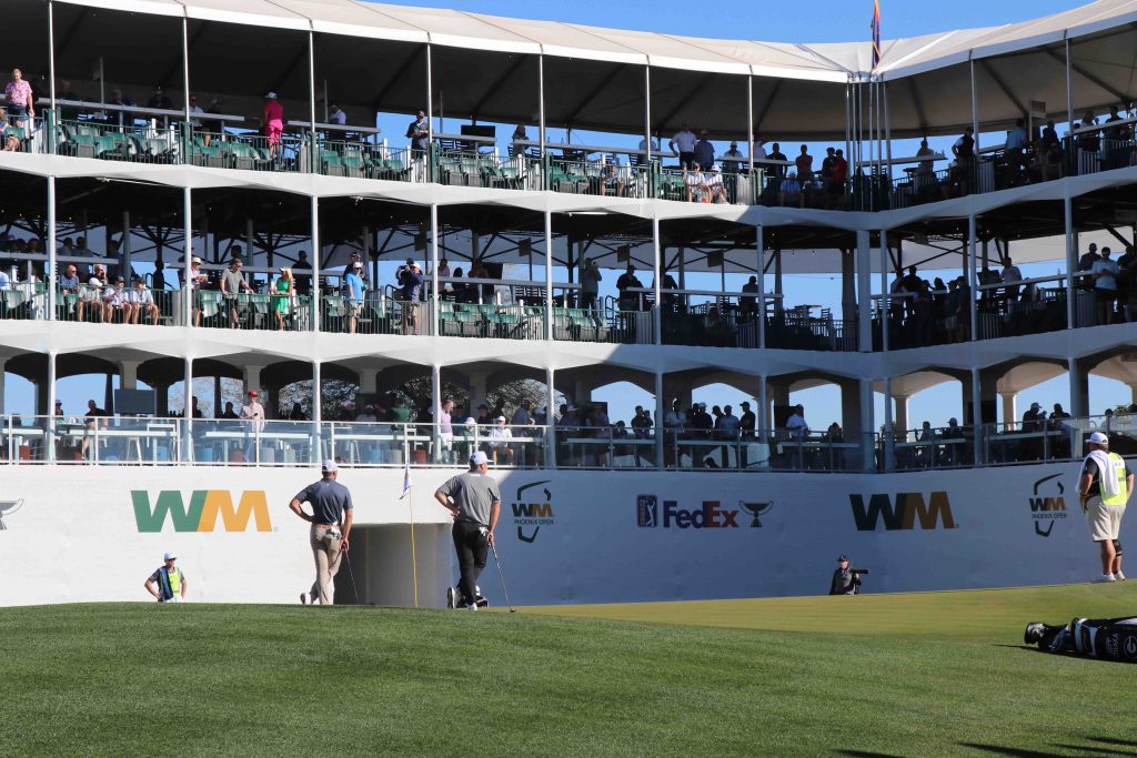 Two golfers wait for their turn at the 16th hole on Feb. 6, 2025. (Simone Roberts/MEDILL)