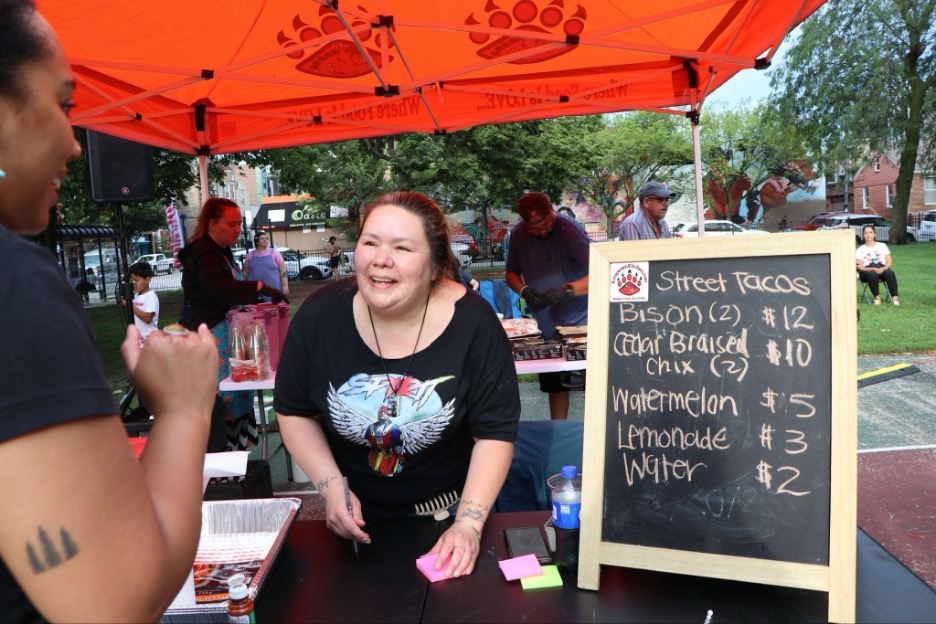 Chef Jessica Walks First with a patron