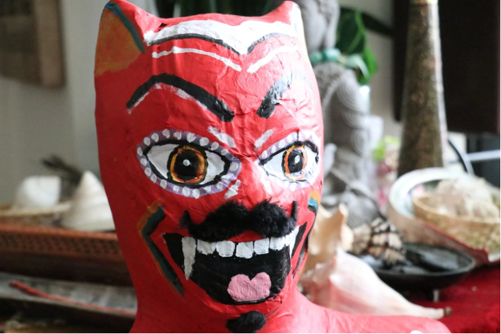 Red devil mask with exaggerated features