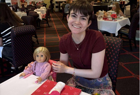 Reporter Olivia Giles with American Girl doll Kit at tea