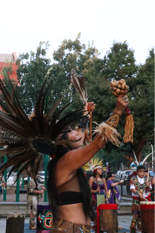 Indigenous artist in traditional regalia
