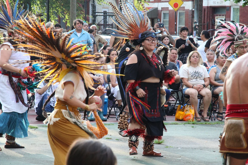 Indigenous dancers in traditional regalia