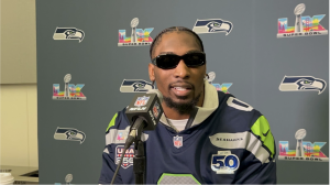 Seahawks player wearing sunglasses at Super Bowl event