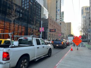 San Francisco street with "Road Closed Ahead" sign.