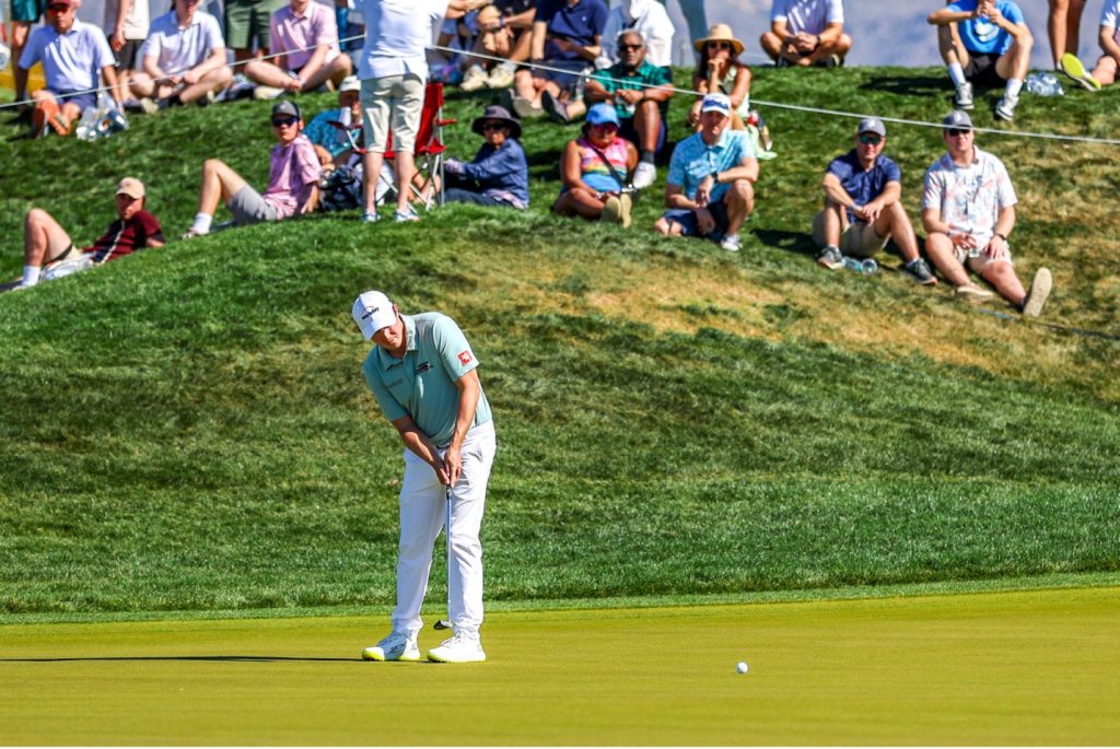 Matt Fitzpatrick putting on the green