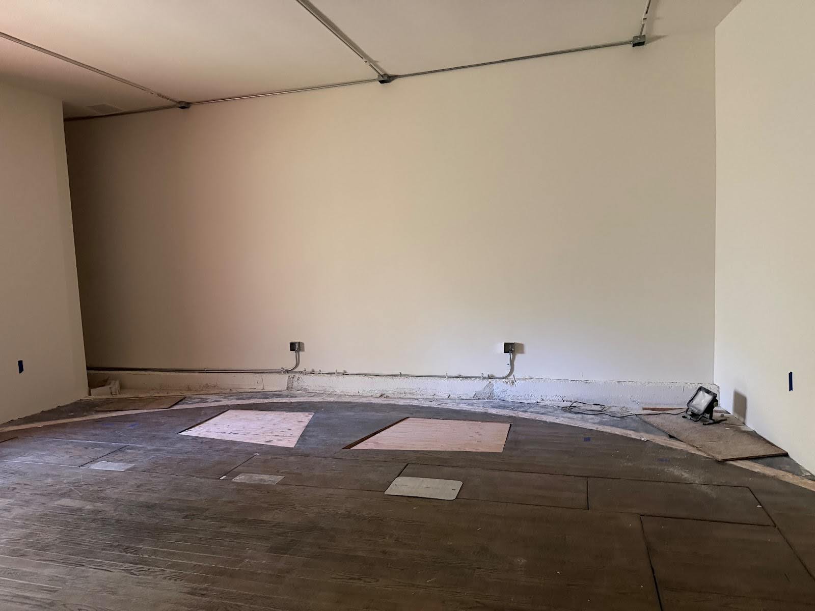 Studio flooring with access panels open.