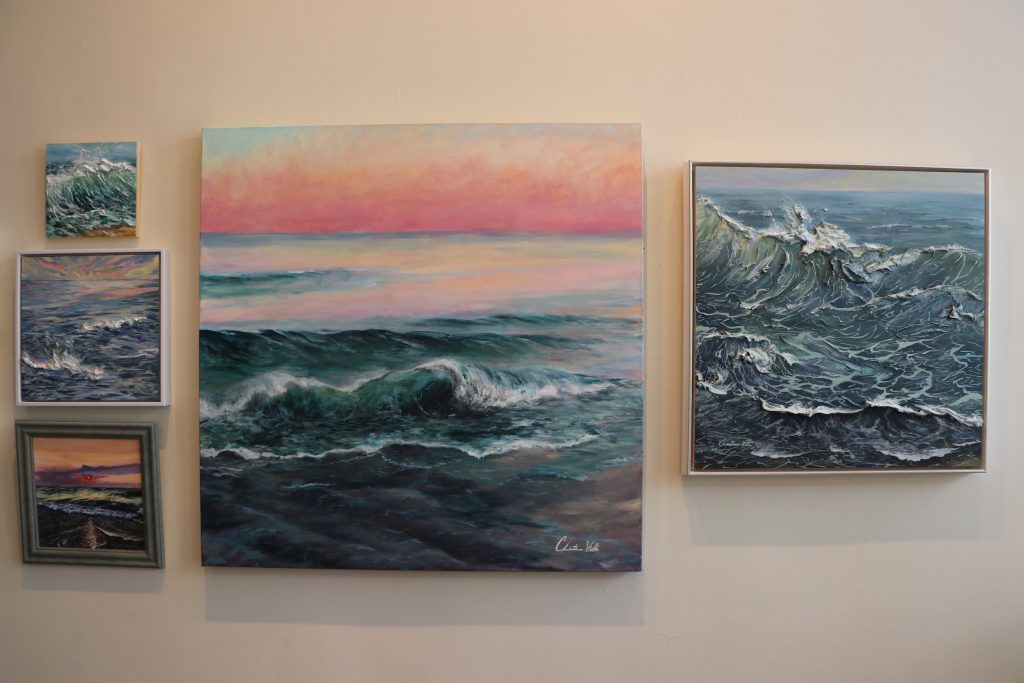 Ocean wave paintings on a wall