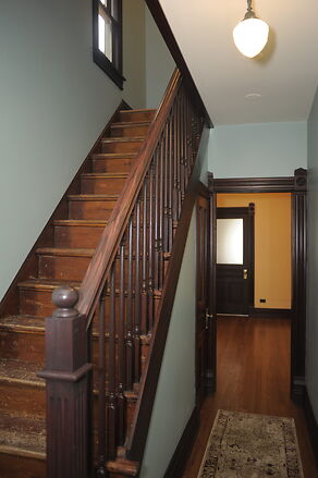 Wooden staircase in a hallway