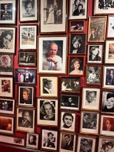 Wall of framed vintage celebrity photos