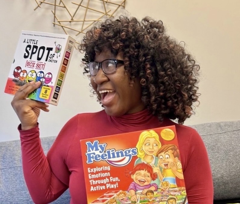 Gainey holding board games