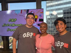 Nick Liu and Eric Gonzalez visit the 303 E. Wacker Drive studio July 7 to show Morgan Norris how to master press-on nails. (Morgan Norris/MEDILL)