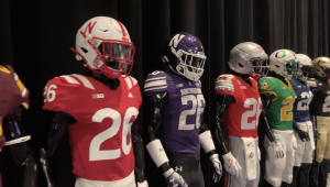 College football uniforms on display at the Big Ten Conference