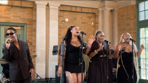 Four singers performing live music