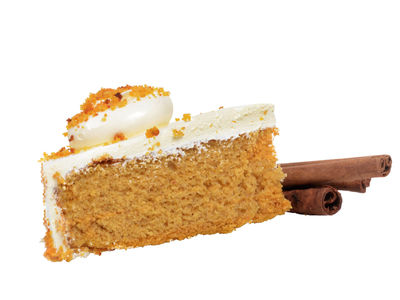 Frosted spice cake with cinnamon sticks