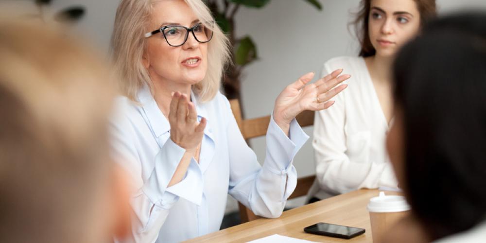 Female business owner speaking to a group