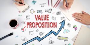 Value Proposition Concept. The meeting at the white office table Value Proposition Concept. The meeting at the white office table