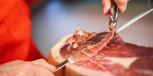Slicing ham.