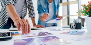 Simple Steps for Starting a Business- Marketing Your Business Advertising designer creative start-up team discussing ideas in office