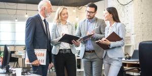 Resources for Starting or Staying in Business Group of business people talking amongst themselves