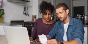 Passions to Profits: Write Your B's Plan and Create a Financial Plan Young multiethnic couple examining home finance