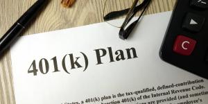 401k Plan with calculator pen and glasses