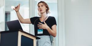 Business woman giving presentation. Business woman giving presentation.