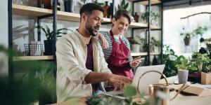 Age of the Entrepreneur Diverse pair in their plant shop