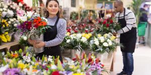 Hispanic woman holding flowers