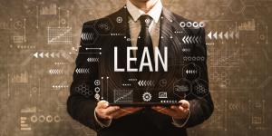 8 Ways To Practice Lean Development In Business man-holding-laptop-lean-development