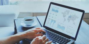 The Practical Google Analytics Guide for Small Businesses person looking at analytics dashboard and metrics