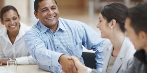 Photo of mentor greeting client