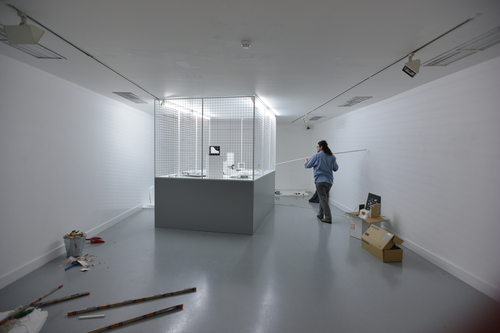 Bart Stolle installing 'Low Fixed Media Show: Finity & Sanity', M HKA, 2012&#169;image: M HKA
