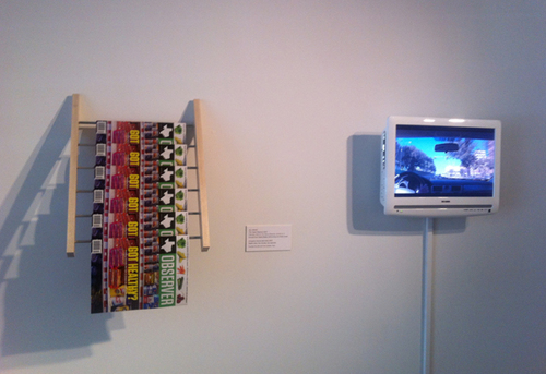 Magazine rack (designed by artist) with Texas Observer February 2012 issue containing Magid's embedded text