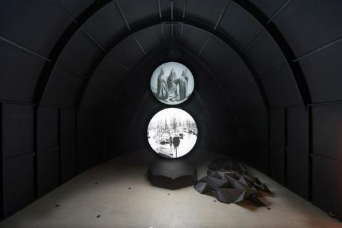 <p>Nowhere Less Now⁴ |Hayward Gallery | 14th October - 4th January 2014 2014. Interior view installation. Materials: cardboard and wood ship; figurehead (mixed material); tetrapods (mixed materails); hemisperical and spherical screens on metal structure; folded paper; HD projections x 2, wired headphones.</p>