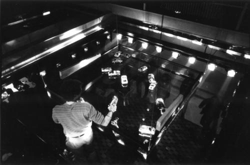 <p>Hugo Roelandt installing toy cars for Auto Matic Art Project, Ex Brussels, 1983</p>&#169; Estate Hugo Roelandt